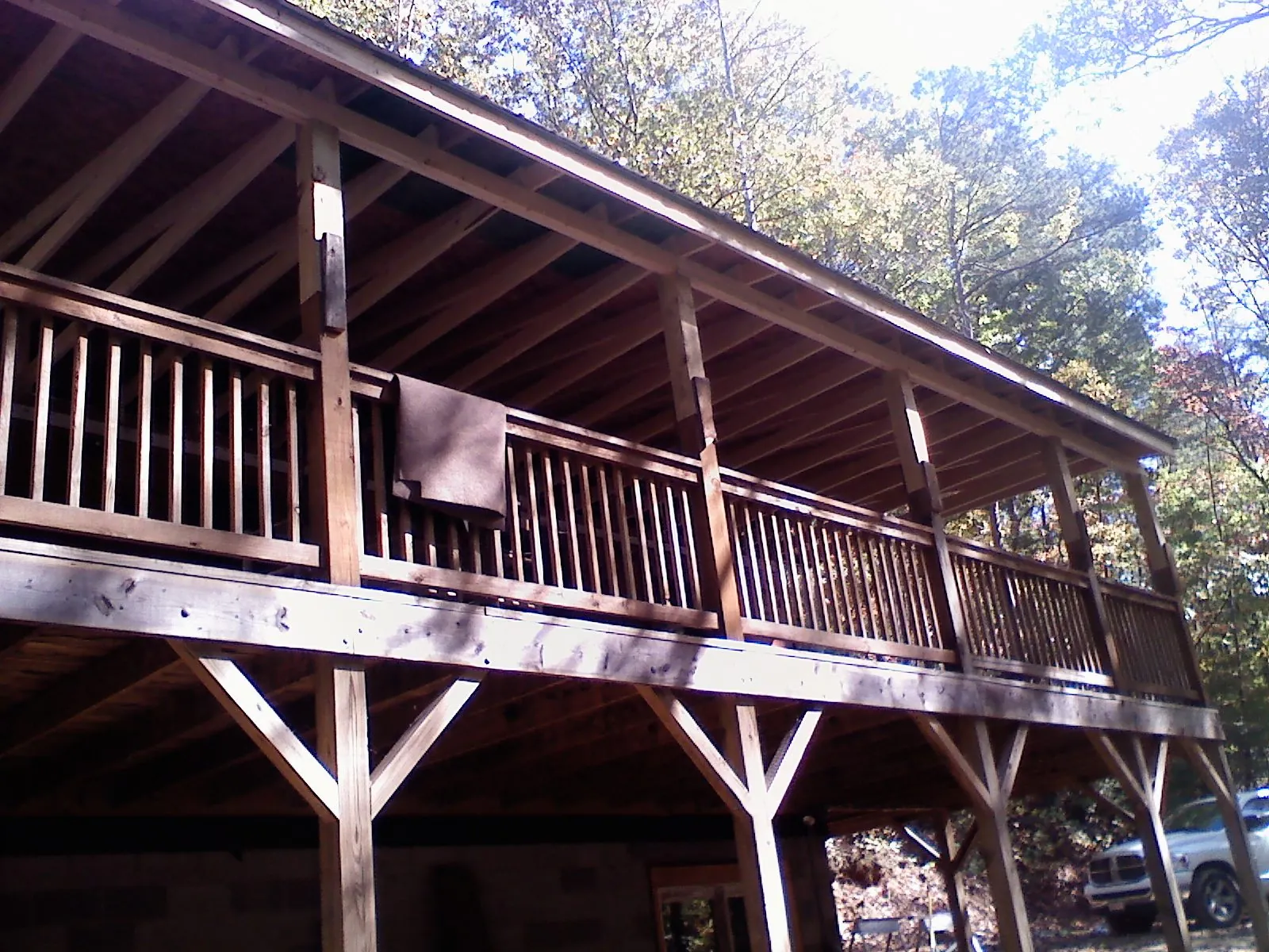Timber framing under a new elevated porch and deck — Roof Leak Repair in Farnham by Roofing Brothers